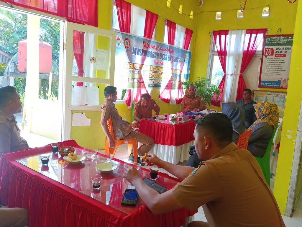 Musyawarah desa yang di laksanakan di kantor desa Wel Wel